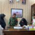 Kepala MA Darul Ulum Banda Aceh, Mariani, S.Ag. Menerima Kunjungan Sertu. Marhalim Barbinsa Kuta Alam untuk Penandatanganan Perjanjian Kerjasama